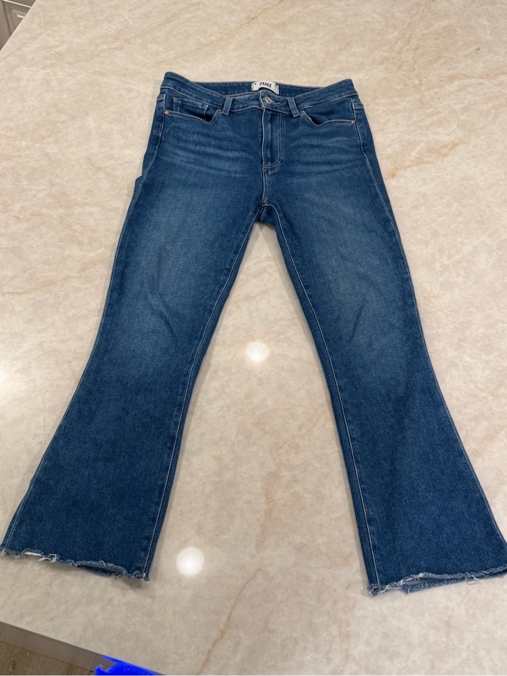 PAIGE Indigo Flare Jeans with Raw Hem